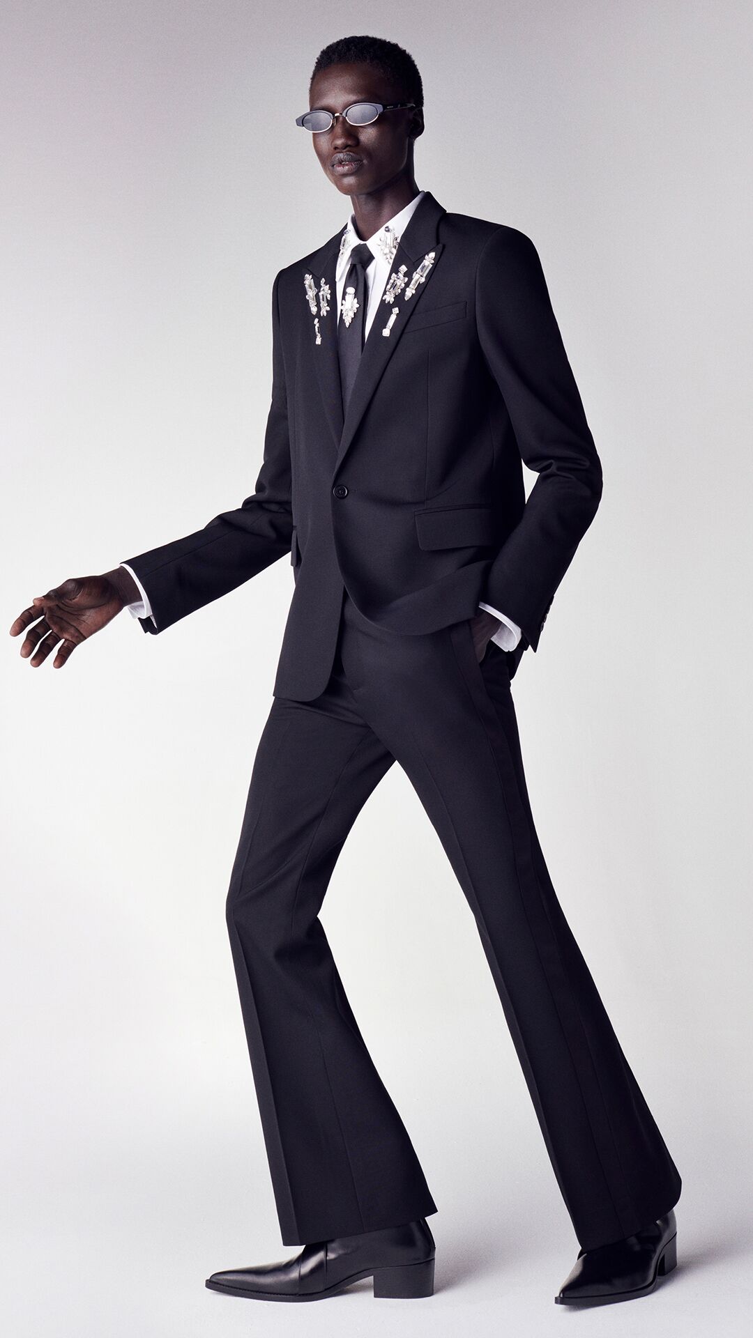 Man in McQueen tailoring